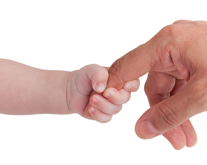 baby clinging into finger.jpg