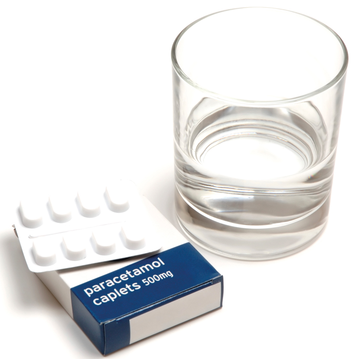 paracetamol caplets and glass.jpg