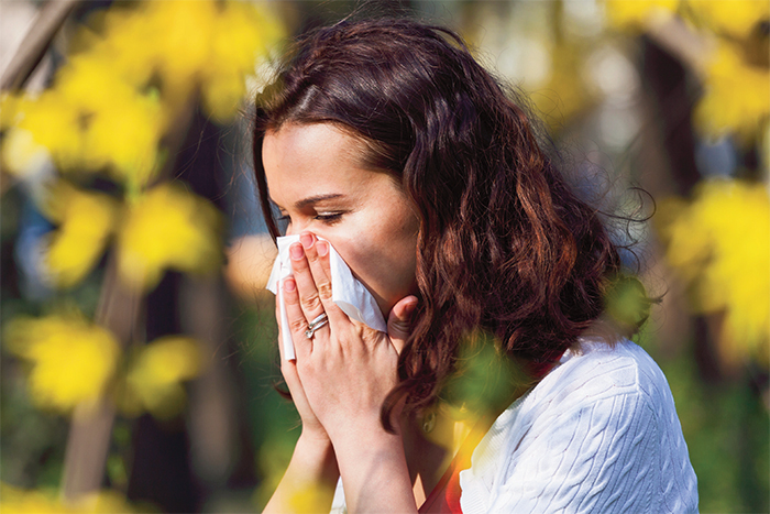 Woman sneezing hayfever.jpg