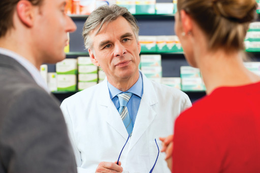 pharmacist with man and woman.jpg
