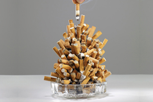Cigarette stubs in ashtray (loads).jpg